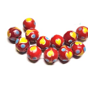Vintage Lampwork Opaque Red with yellow flowers 12mm