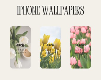 Op de afbeelding: Drie telefoonachtergronden met een kalender voor april met een bloemige achtergrond. De eerste achtergrond heeft witte bloemen, de tweede heeft gele bloemen en de derde heeft roze bloemen.