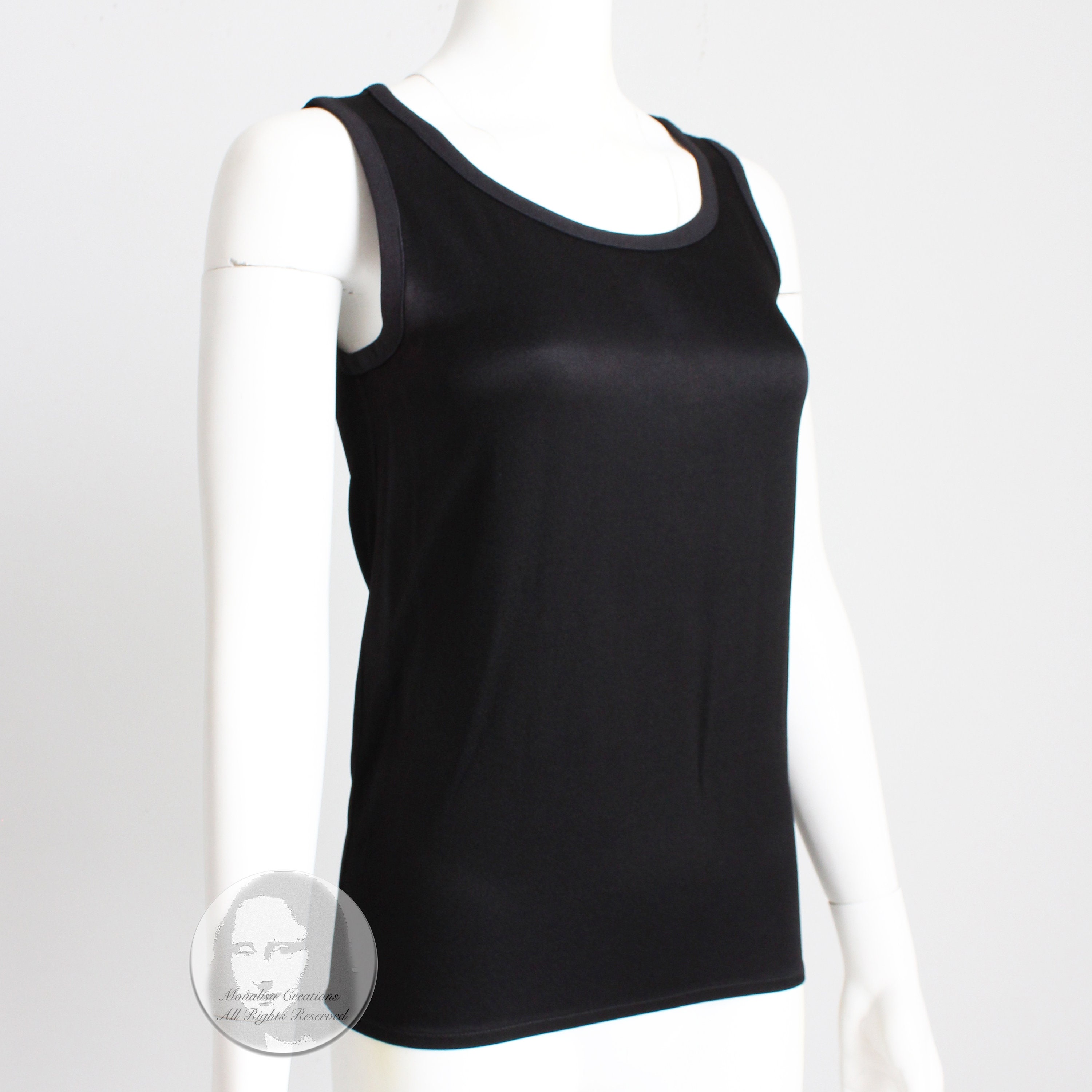 新品タグ付き Yves Saint Laurent ブラック タンクトップ 34 新品タグ付き Yves Saint Laurent ブラック タンクトップ 34