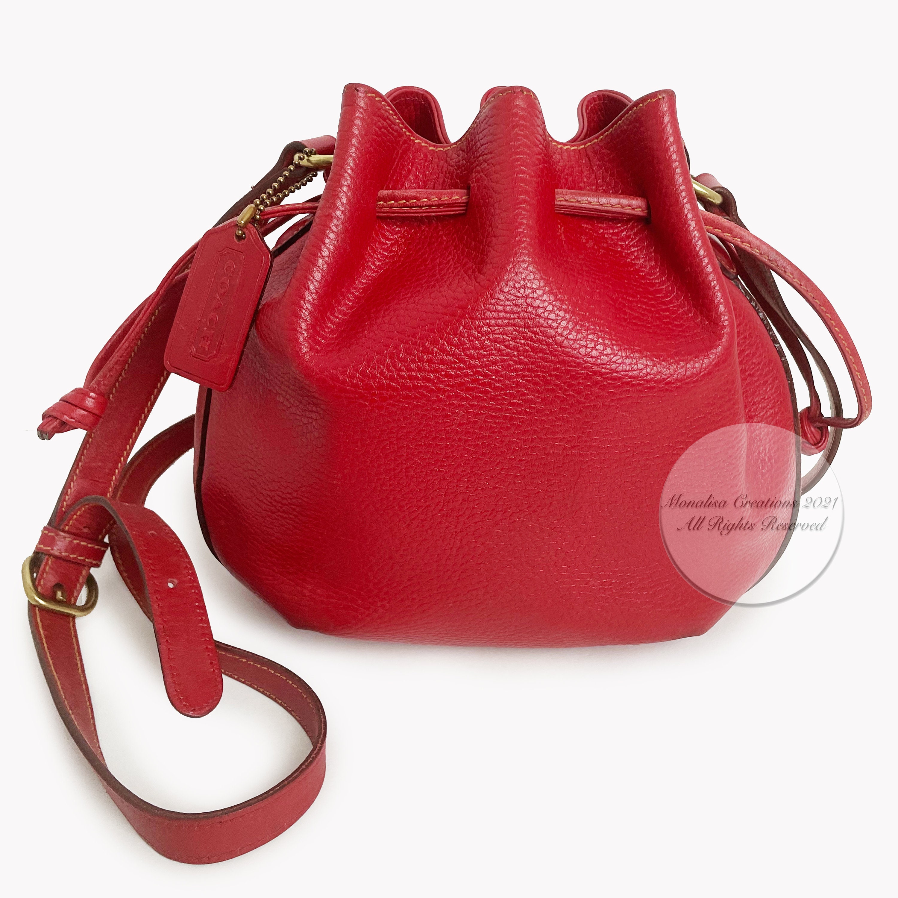 Coach Drawstring Bucket Bag With Grommet www.diestroweb.com