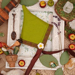 May include: A set of three ceramic mugs with a speckled, matte finish in light blue, cream, and grey. The mugs have a simple, modern design and a comfortable handle.