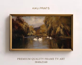 May include: A framed landscape painting featuring a serene lake scene with white swans. The artwork, with a gold-colored frame, depicts trees and a cloudy sky. The text "KIKU PRINTS" is at the top, and "PREMIUM QUALITY FRAME TV ART 3840x2160" is at the bottom.
