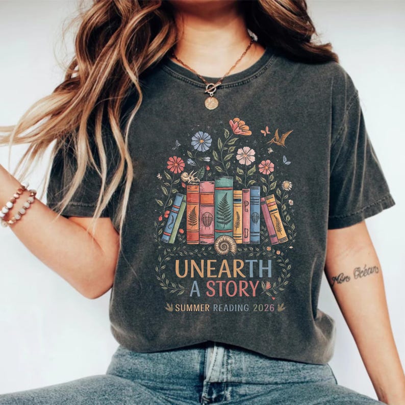 Unearth A Story Shirt, Summer Reading 2026, Fossil Book Lover Gift, Librarian Teacher Shirt, Archaeology Reader, Paleontology Science Gift image 2