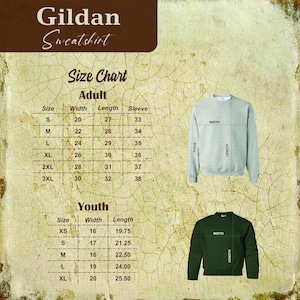 May include: Size chart for Gildan sweatshirts in adult and youth sizes. The chart shows width, length, and sleeve measurements in inches. The chart is displayed on a brown background with a gray sweatshirt and a green sweatshirt.