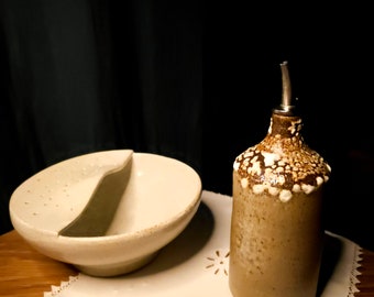 oil cruet and fruit strainer, radish...