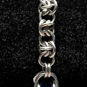 8&quot; Tennis Bracelet in Barrel Weave with Captured Metallic Blue Crystals