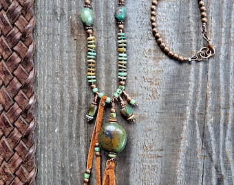 Genuine Turquoise 22" charm necklace , copper beads, picasso glass beads, and repurposed suede tassel and charm