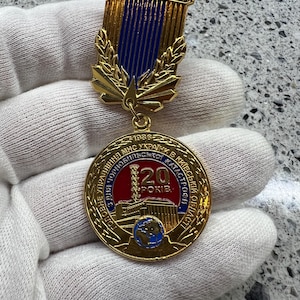 Medaglia ucraina - CHERNOBYL LIQUIDATOR "per aver eliminato le conseguenze dell'incidente di Chernobyl"