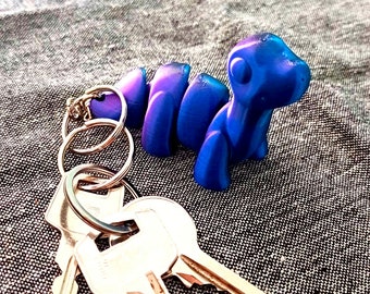 Articulated anti-stress keychains