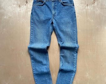 Vintage des années 90 Levi's 631 Jeans Orange Tab Light Wash, jambe fuselée / Taille homme 33 x 34