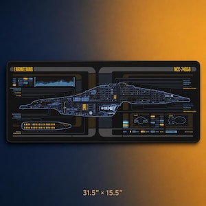 May include: A rectangular black desk mat featuring a detailed blue schematic of a starship. The design includes technical labels, engineering diagrams, and the text ENGINEERING and NCC-74656. The mat measures 31.5 inches by 15.5 inches.