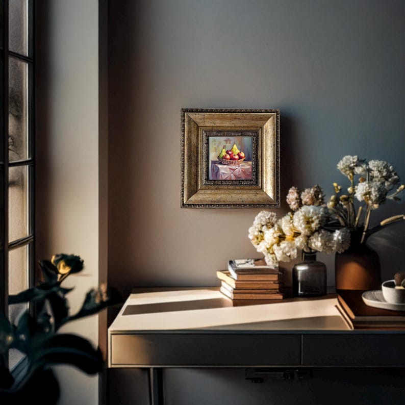 The Pear Wall Art 🍐 and Apple Painting 🍎 details are so lifelike that they almost seem to jump off the canvas, offering a vibrant visual treat. This Fruit Still Life Art is more than a painting; it’s a celebration of nature's captured in an artful.