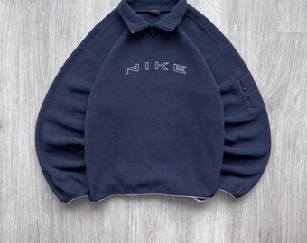 Sudadera vintage Nike de los años 90 con media cremallera y logotipo bordado en el centro de Nike (año 2000)