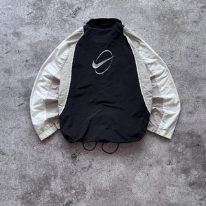 ウォーキング・ランニングウェア 00s Nike raglan nylon jacket y2k