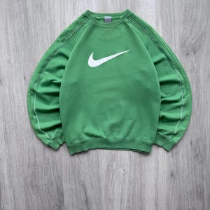 nike mini swoosh oversized boxy sweatshirt in green