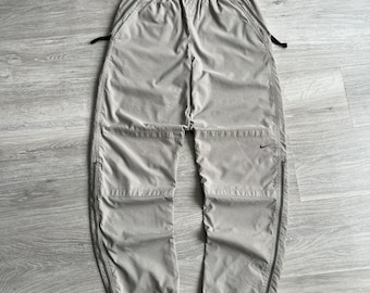 Pantalones cargo con cremallera y múltiples bolsillos Nike Vintage Y2K con logotipo mini Swooh Gorpcore