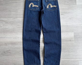 Calça jeans vintage Evisu estilo japonês, larga e com bolsos grandes com logo.