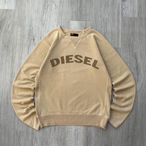 Sudadera vintage Diesel Y2K con cuello redondo y logotipo grande de Diesel en el centro