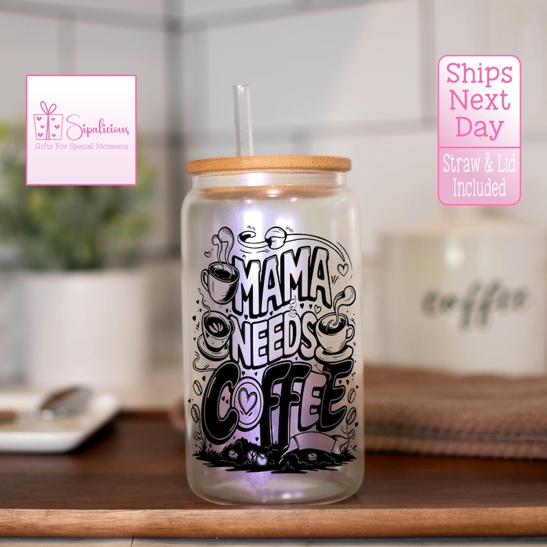 May include: A clear glass tumbler with a bamboo lid and a black and white graphic that says "Mama Needs Coffee". The tumbler has a built-in LED light that illuminates the graphic.