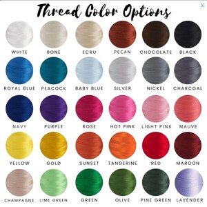 May include: A color chart displaying thread color options. The image shows a variety of thread colors, including white, blue, pink, yellow, and green. Each color is labeled with its name, such as "Royal Blue" and "Hot Pink". The text "Thread Color Options" is at the top.