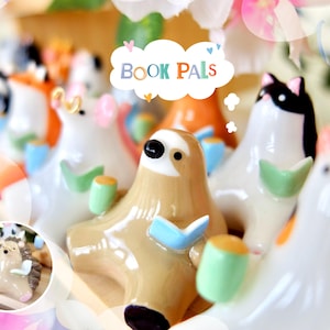 手作りの風変わりな粘土の動物の置物：読書好きへのギフト