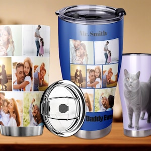 May include: Three stainless steel travel mugs. One blue mug features family photos and the text "Mr. Smith" and "Daddy Ever". Another mug has a collage of family photos. The third mug is lavender with a gray cat.