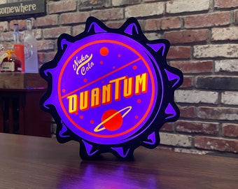 Quantum Nuka Cola bottlecap inspired light box - 2 versions- uv  LED and 6500k white LED light source. Both versions are UV reactive.