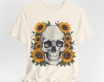 May include: A white t-shirt with a graphic of a white skull surrounded by yellow sunflowers.