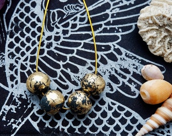 Black Luxe Necklace -- handmade clay beads, decorated with gold foil, for a unique and stylish look all in one necklace