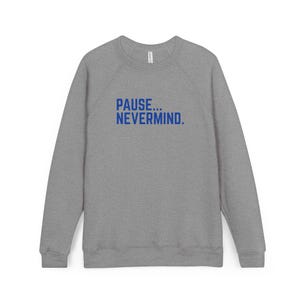May include: A heather gray sweatshirt with long sleeves. The text "PAUSE... NEVERMIND." is printed in blue across the chest. The sweatshirt has a crew neck and a casual style.