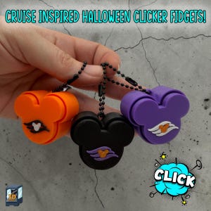May include: Three mouse-shaped clicker fidget toys in orange, black, and purple, each featuring a small cruise ship logo and attached to a black ball chain. The text CRUISE INSPIRED HALLOWEEN CLICKER FIDGETS! and CLICK appear in the image.