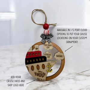 One wooden circle ornament with a cruise boat image and 3 port locations clouds. The cruise boat image text says "Add you Cruise dates and ship logo here". The port clouds text says "Available in 1-5 port cloud options to put your cruise locations on your custom ornament!" The ornament comes with 2 wooden beads, a black and white mini fabric bow and twine for hanging.