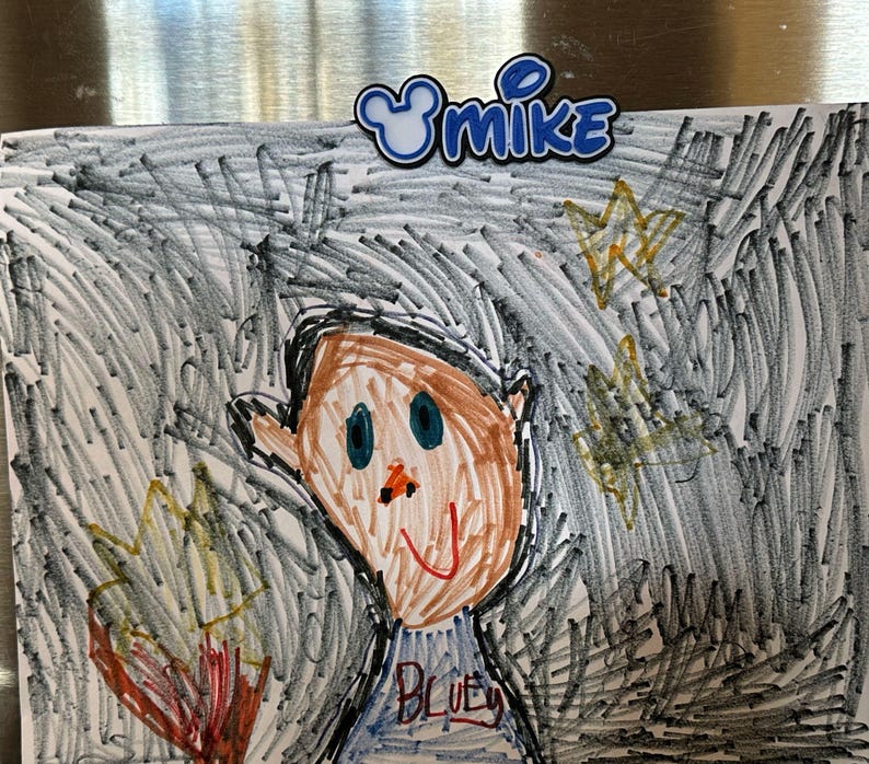 An example of the custom name magnet holding up a child's artwork on the fridge. The magnets are three layers, but are a sleek and sturdy look. They will hold up most items on the fridge with ease. The magnets are also perfect for cruise doors, locker doors or anywhere that will hold a magnet.
