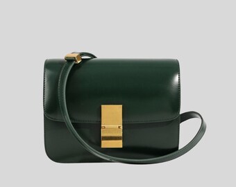 Designer Italian leather bag crafted from calfskin, featuring a box design.