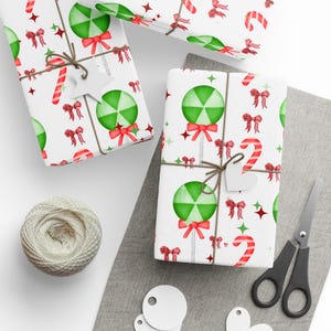 Festive Candy Cane Wrapping Paper : Holiday Gift Wrap with Peppermint Candy & Bow Design, Perfect for Christmas Gifts