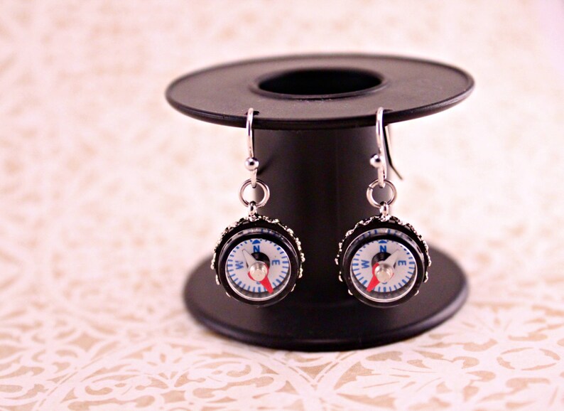Keep It Moving! Hammered Compass Stud Earrings main image 1