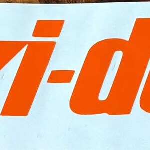 May include: Orange ski-doo logo on a white background.