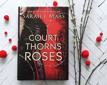 Una corte de rosas y espinas / Sarah J. Maas