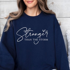 Stronger Than The Storm Sweatshirt: Christian Women&#39;s Inspirational Hoodie