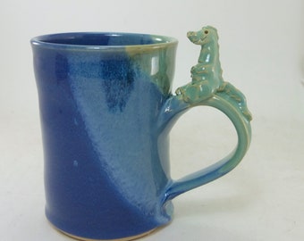 dragon or dinosaur mug