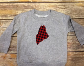 May include: Gray sweatshirt with a red and black plaid outline of the state of Maine.