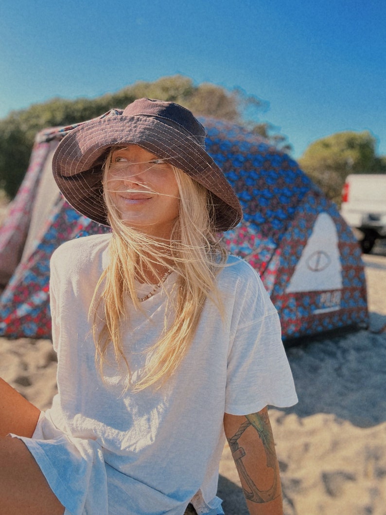 Brown Corduroy Wide Brim Beach Hat on Blonde woman on beach