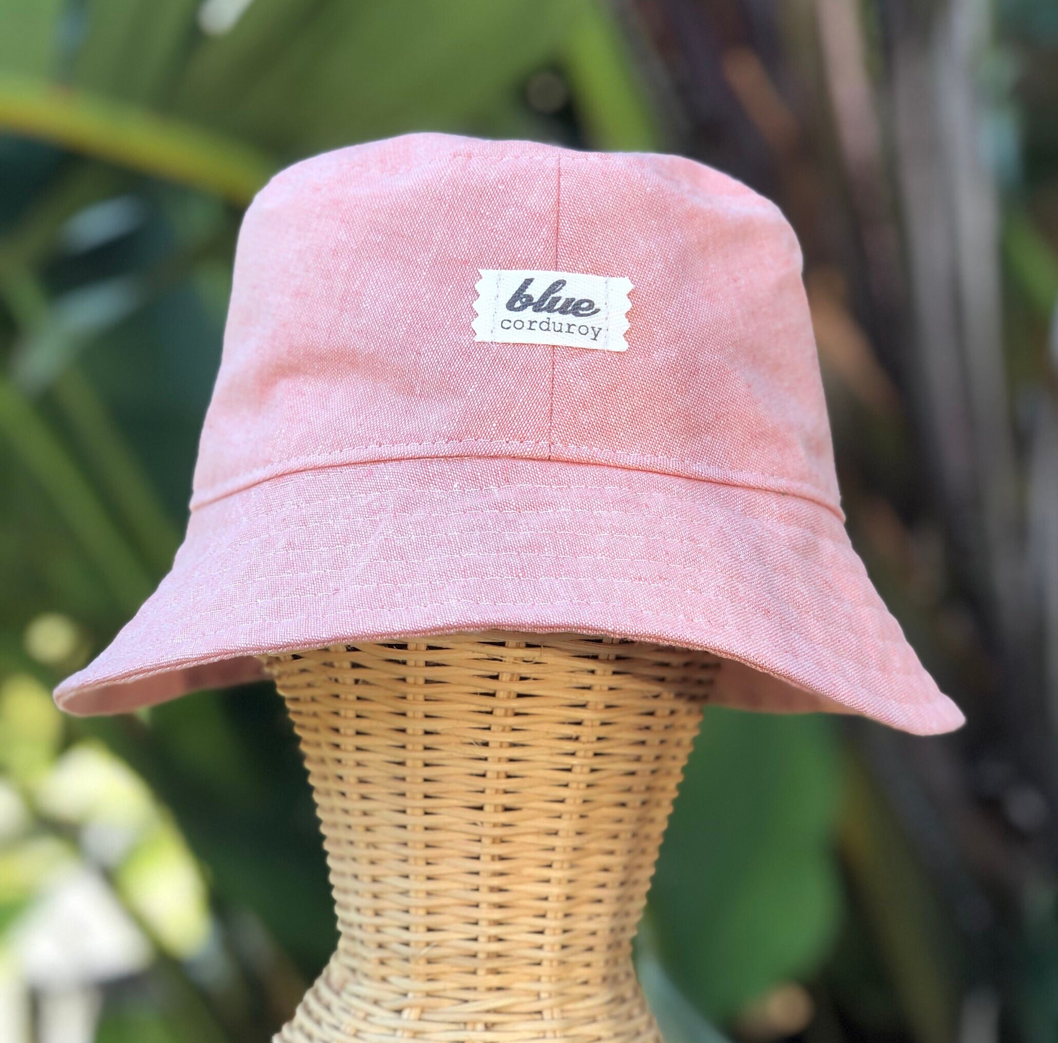 Pastel pink bucket hat on sale