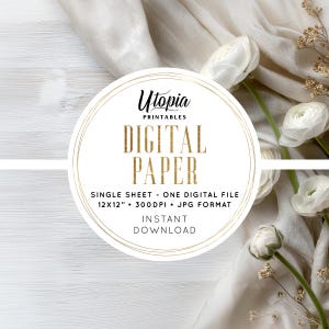 Puede incluir: Gráfico circular con el texto "Utopia Printables DIGITAL PAPER" en dorado. El texto debajo dice "SINGLE SHEET - ONE DIGITAL FILE 12x12" • 300DPI • JPG FORMAT INSTANT DOWNLOAD". El fondo incluye flores blancas y tela color crema.