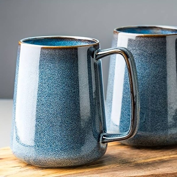 Sapphire Sky: Handmade blue Ceramic tea and coffee Microwaveable 700ml mug.