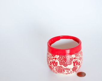 Red birds ethnic patterned ceramic wine cup tumbler handmade on the wheel out of clay and glossy glazes