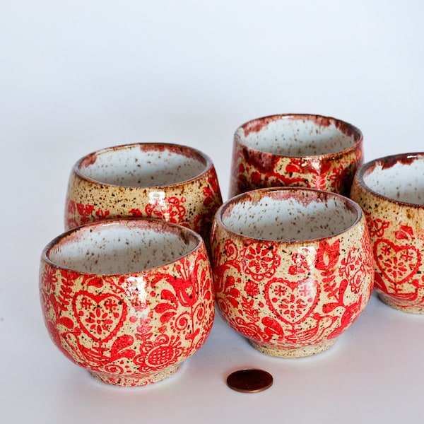 Red birds ethnic patterned ceramic wine cup tumbler, handmade on the wheel out of clay and glossy glazes