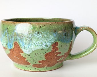 Cappuccino cup, Coffee Cup, Tea Cup, Handmade Stoneware, Speckled buff clay, wheel thrown, glazed in green with blue skies, clouds, fir tree