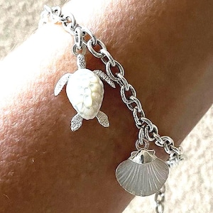 Handgemaakte 925 zilveren bedelarmband: parelmoer zeedieren