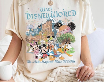 レトロなウォルト・ディズニーワールド コンフォートカラー シャツ、90 年代のマジックキングダム マーチャンダイズ、地球上で最も魔法のような場所の T シャツ、ディズニーランドのミッキー ギフト シャツ。